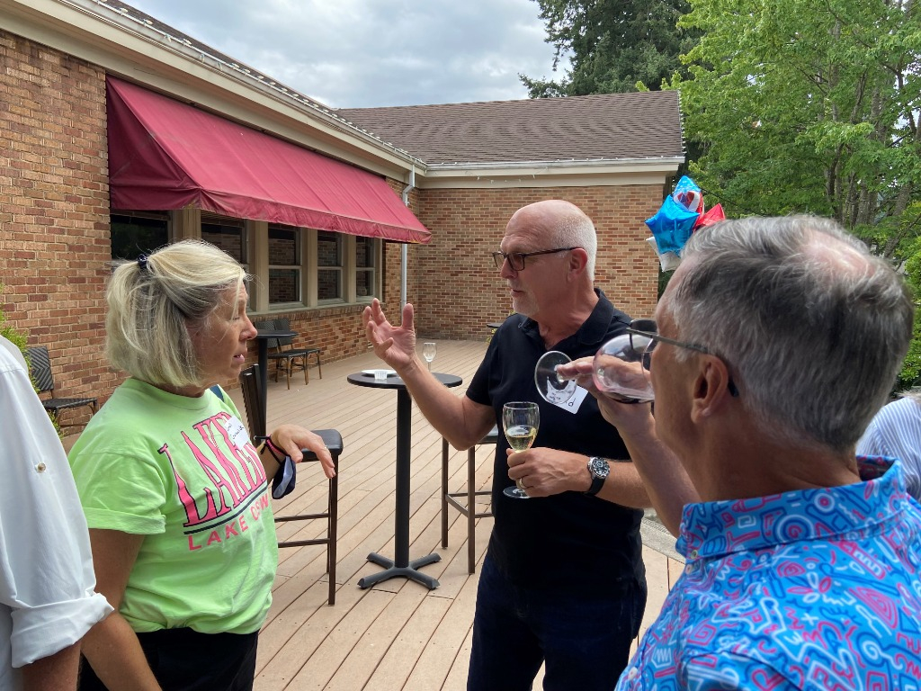 Tom Sands explains Art to Carrell and Rick Teeter