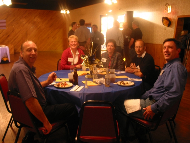 Table of People: Classmates shown: Colleen Malec Reistad and Brad Resch