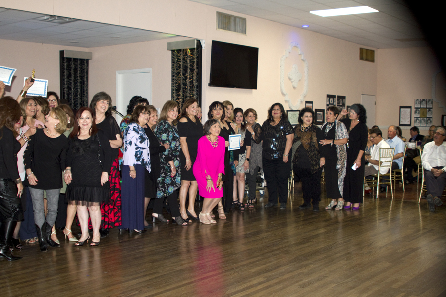 Social club members in attendance with certificates 