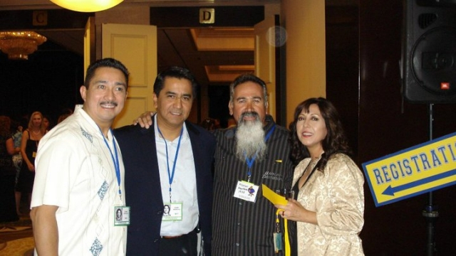 Henry Mendoza (second from left)