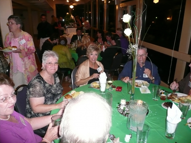 Forgive me on this one...I need help. Sue Logan is in the background and Phyllis Schneider and her husband are at the table....could someone fill me in on the two ladies whos names are slipping my brain? Thanks