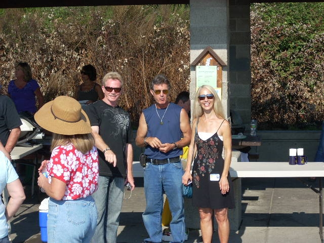 John Olson with these very strange boots on, Ken Baker and Patti Rohrback.