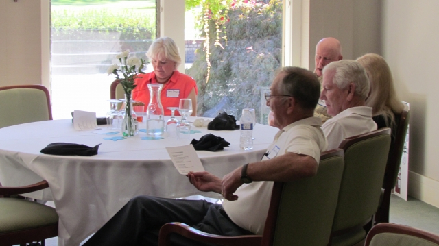 Karin Brown, Anton Miller (60 CP Grad), Gina & Ron Eaton, and Roger Brown join in on singing the Fight Song