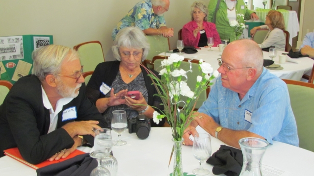 Dick and Tammy Smith spend time with Dave Thompson (with Phil Jacobs, Sharon Martin Kline, and Judy Urdahl Kimura in the background)
