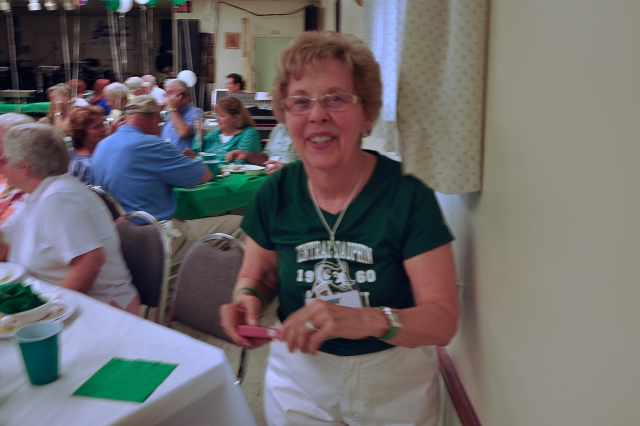 Part of CD Ram-Jam-2013 Album-by Paul Holtzman.  
Bonnie Kapp Johnston 60 - working hard, but always with a smile on her face.
