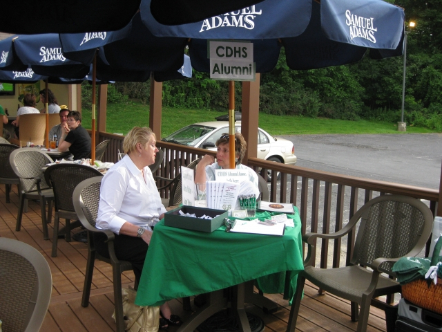 Wendy Wickenheiser 73 & Bev Davidson Bosak 62 welcome our guests as they arrive.