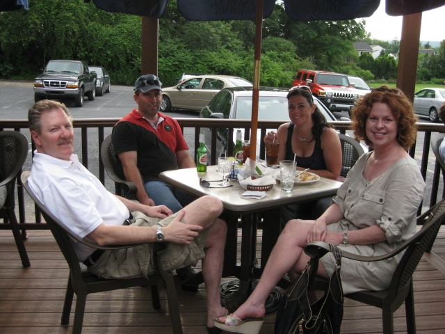 Scott Collins 76, Chris Wherley, Chrissie Dewey 99, and Scotts guest