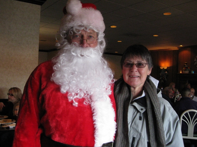 Betty Miller 63 is all smiles with Santa.