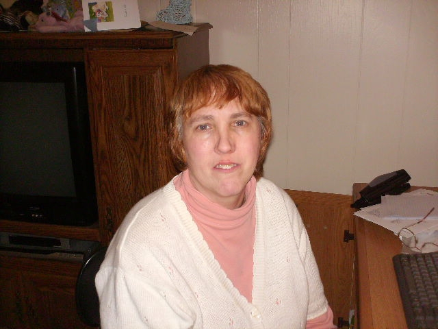 Tracey in her apartment