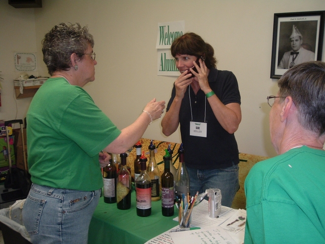 Karen Witmer Mummert 60 takes a call for Sue Keller of West Hanover Winery.