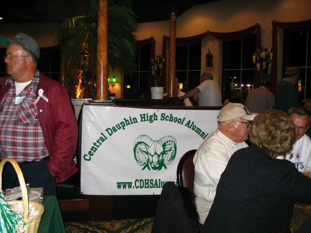The crowd gathers at Gilligans. On left, Sam Swartz, 63.