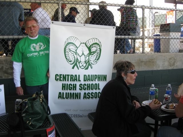 Herb Wragg58 sets up our banner. Bev Bosak 62 enjoys dinner with her family.