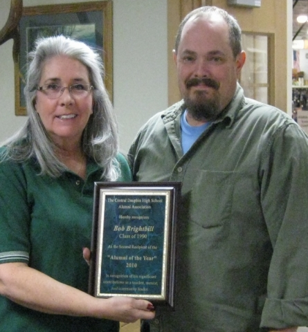 Bob Brightbill 90 receives his plaque