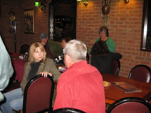 Robbin Johnston Heilig 73 talks to Keith Davis 74.