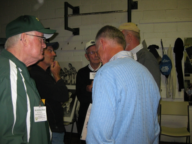 Coach Terry King, Max Smith 73, Coach Max Smith Sr.  Backs to camera - Coaches Holbrook & Sheeler.