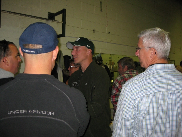 Current CD Head Coach Glen McNamee (center) meets the 72 team.