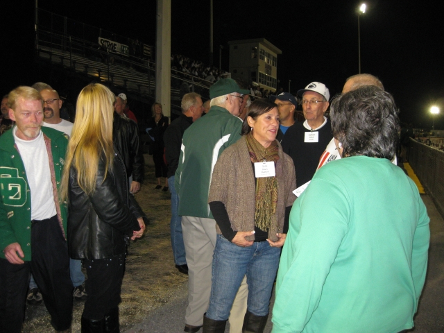 The team gathers in the end zone to make their appearance on the field at half-time.