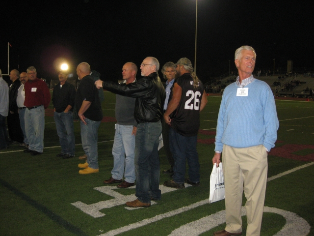 The team gathers on the field to be introduced to the crowd.