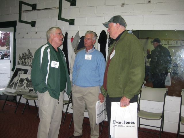 Coaches Terry King, Bob Holbrook, and Jim Zimmerman. Discussing defense strategies??