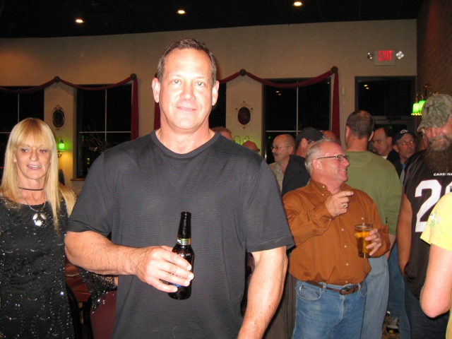 Brenda Foreman Messina 73, Mike Byrnes 73, Earl Stepp 73 chats with Mark Cricket Rosati 74.