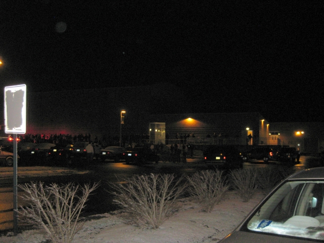 Fans welcome the Rams as they return to the high school amid a host of fire trucks with lights and sirens blaring!