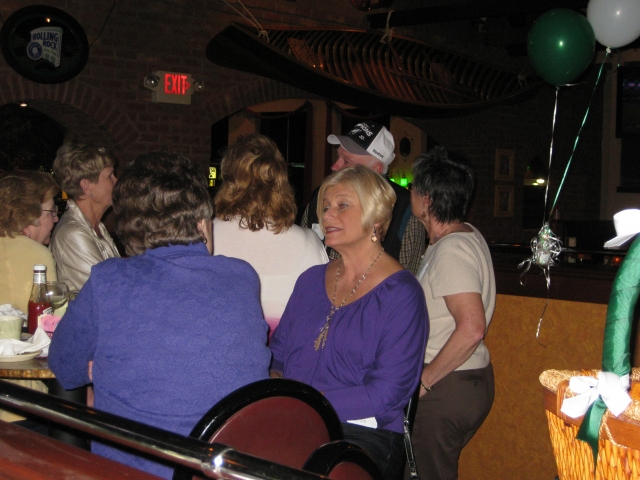Debbie Gross Bayura 71 chats with Jan Straining Davis 61.