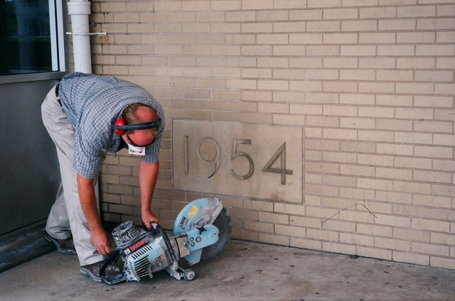 Mike Zorek,74 grad & Masonry Instructor at DCTech, begins the work.