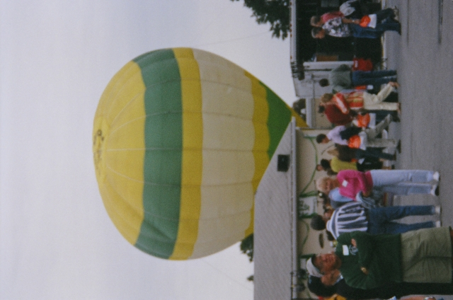 The hot air balloon prepares to lift off.