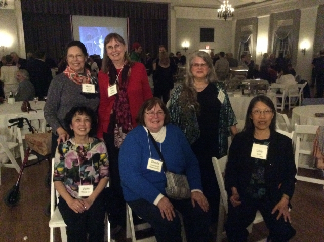 Front row: Vicky Wong Tan, Sheila Cavanaugh Wawrzynek, Lisa Lee
Back row: Mary Marshall Blanc, Ann Janka Caddell, Paula Chernyshev Finnegan