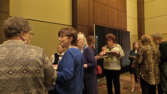 (7) Buffet Line.  Judy Glasgow in the blue.