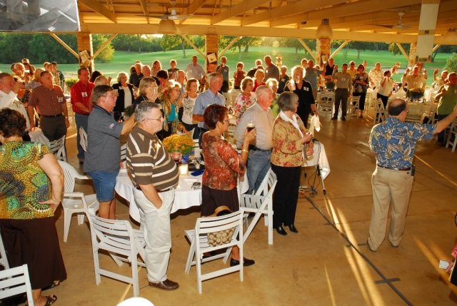 Toast being offered to the deceased classmates.