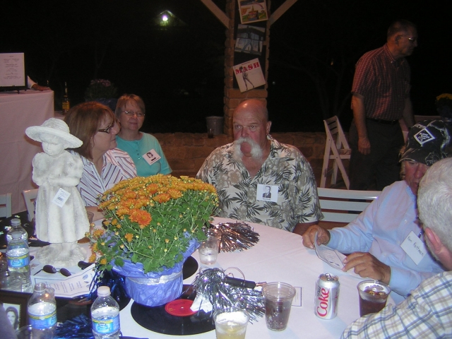 Ruth Anne and Arlene Crawford talking to Terry Purdy.