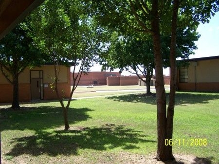 Looking to the west, the Gym is on the left, south wing on the right; in the distance is Central Junior High where Pennington Field was located and the wide open spaces.