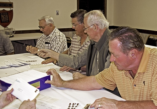 Bob Stimmel, Dick Gray, Pete King, and Dan Frandsen practicing fine muscle coordination.