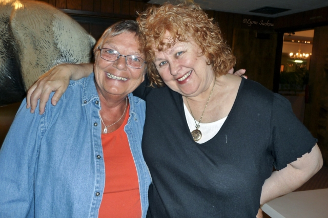Sherri Moore and Mary Campbell, getting positive vibes to help pack up the memorabilia.