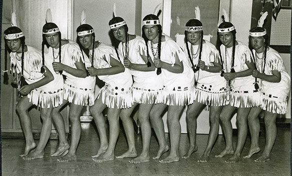 High school girls dressed like Indian maidens for some reason.  Im second from the right (Lynn Davison Suckow) but dont recall the event or know the names of the other girls.  HELP!