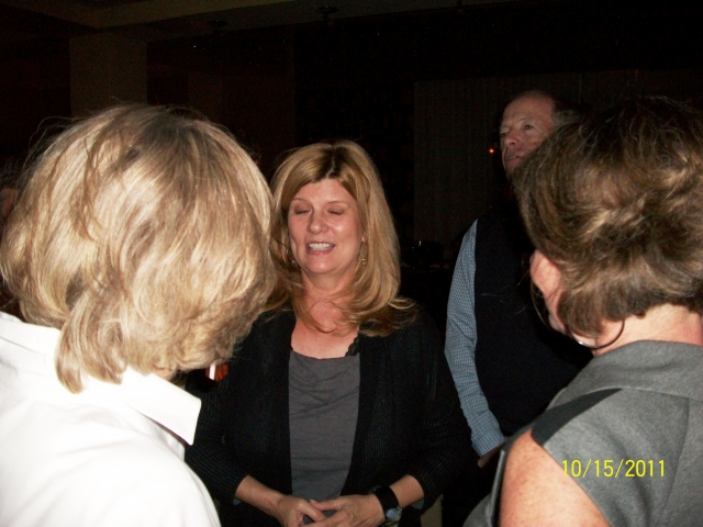 Topley Edenton talks with old friends at the dance