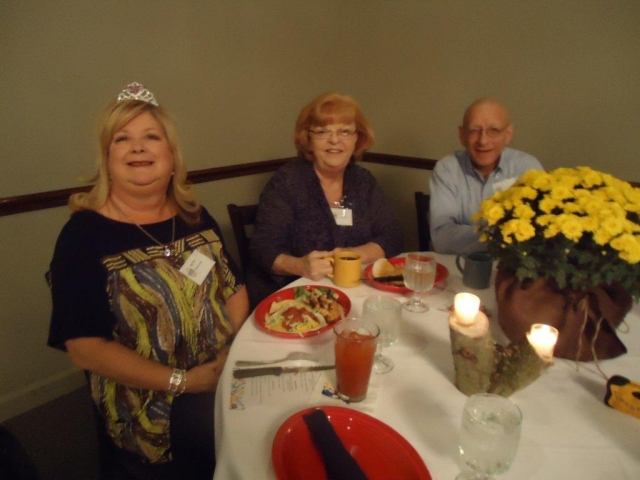 Betty Butler Roe, Phillip Lovett and his wife at the Brunch