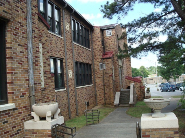 Right side of the school in the front