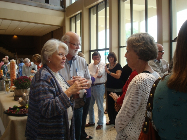 Connie Ballard Duncan, Roy Blackwell talking to classmates at the Brunch