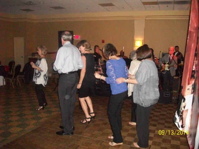 Classmates doing the Shuffle on the dance floor