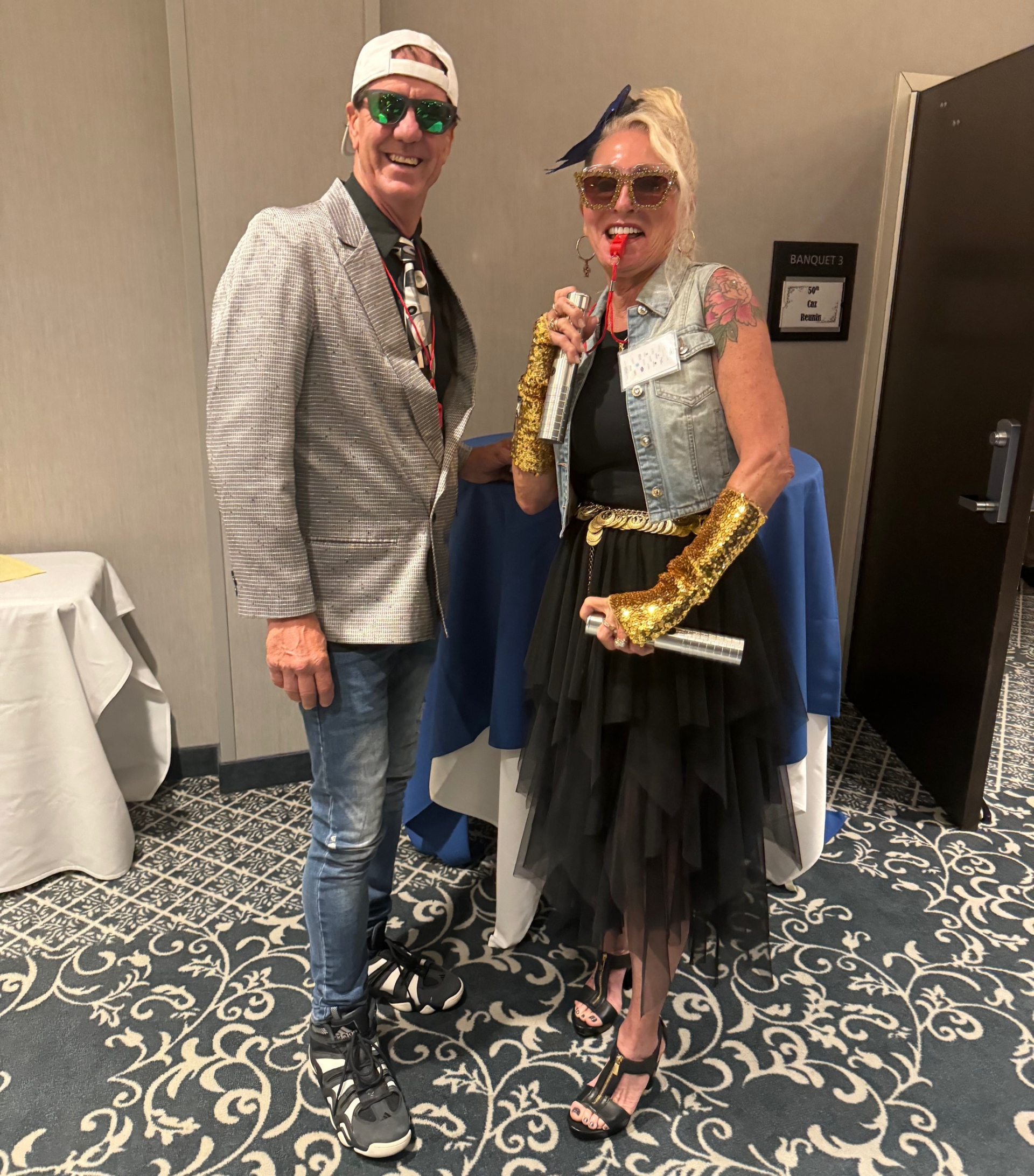 Stan Popek and Lynne James getting ready for the awards presentation