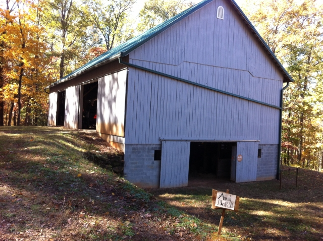 Amish barn build with timbers on property.
