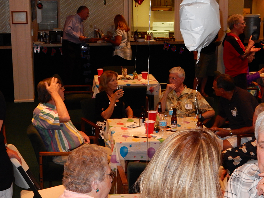 Dan McGrew, Susi Smith, Jim Bonham and John Jesmer. Background: Dudley Mitchell and Vicki Collins head for the pizza!