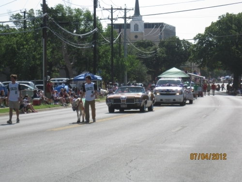 Little Arlie leading the Alumni floats in the July 4, 2012, parade!