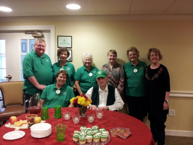 Alumni celebrating Mr. John Webbs 90th birthday party 11.28.13