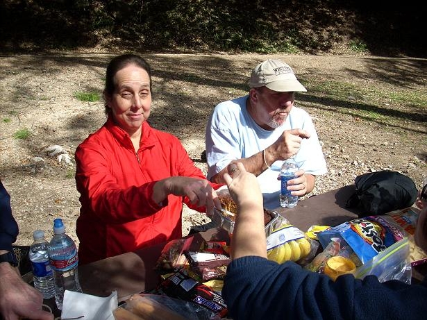Lark passes around the gingerbread. 