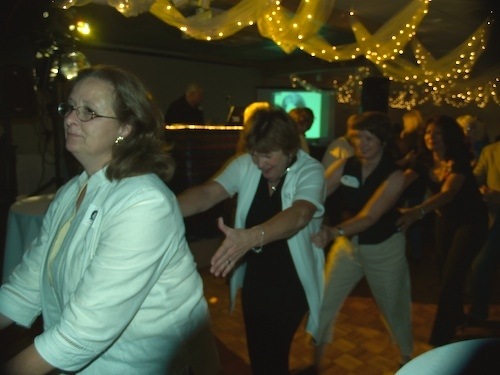 Dancing around the room, kinda like the ol days of the Sock-Hop