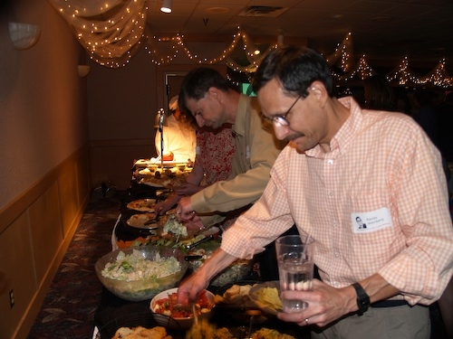 Jeff Silesky and Randy Weinberg enjoying the food line