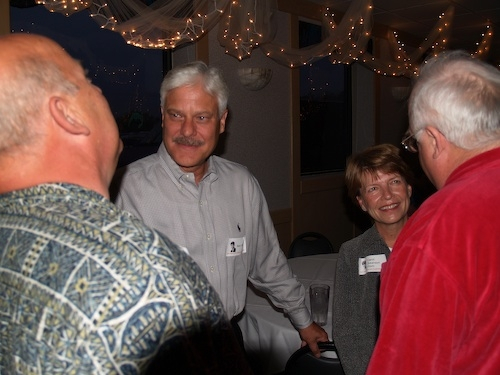 Ron Flom and Carol Swanson Flom talk with Mike Reuter and Jim Endres